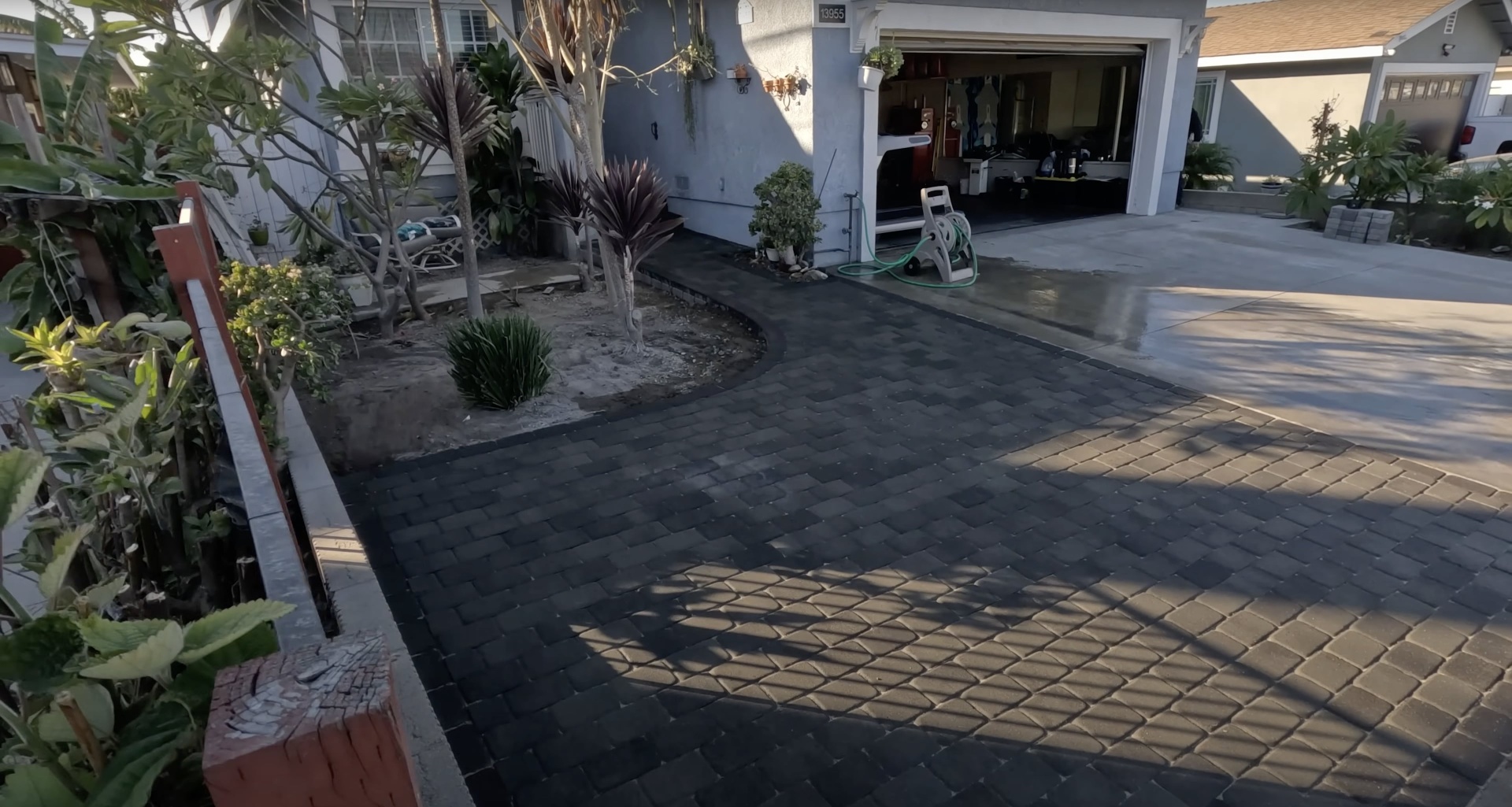 Premium concrete materials and professional installation techniques High-quality decorative concrete pavers and professional installation work