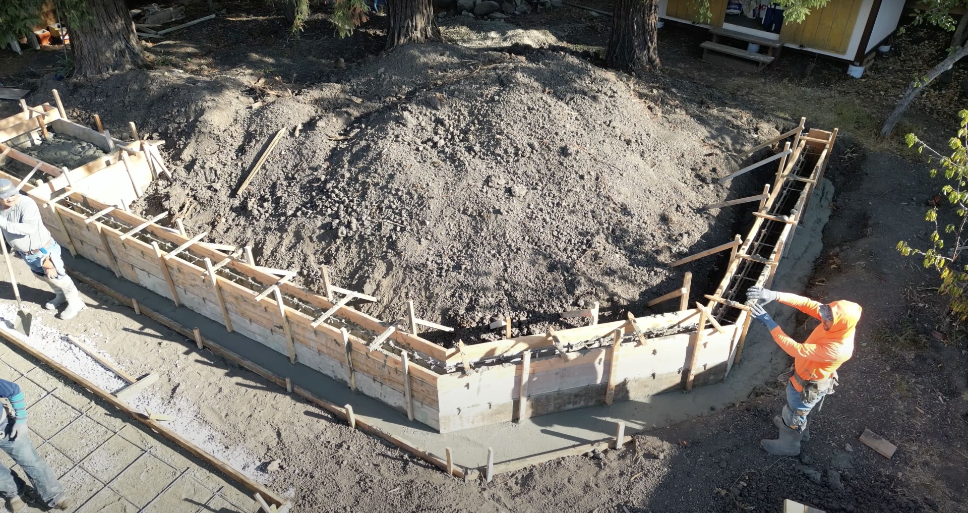 Professional drainage solutions for concrete installations Concrete foundation preparation with proper drainage systems and waterproofing