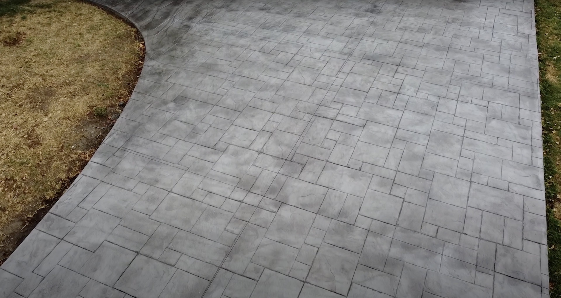 Stamped Concrete Patio - Ashlar Slate Pattern Stamped concrete patio with ashlar slate pattern showing professional craftsmanship