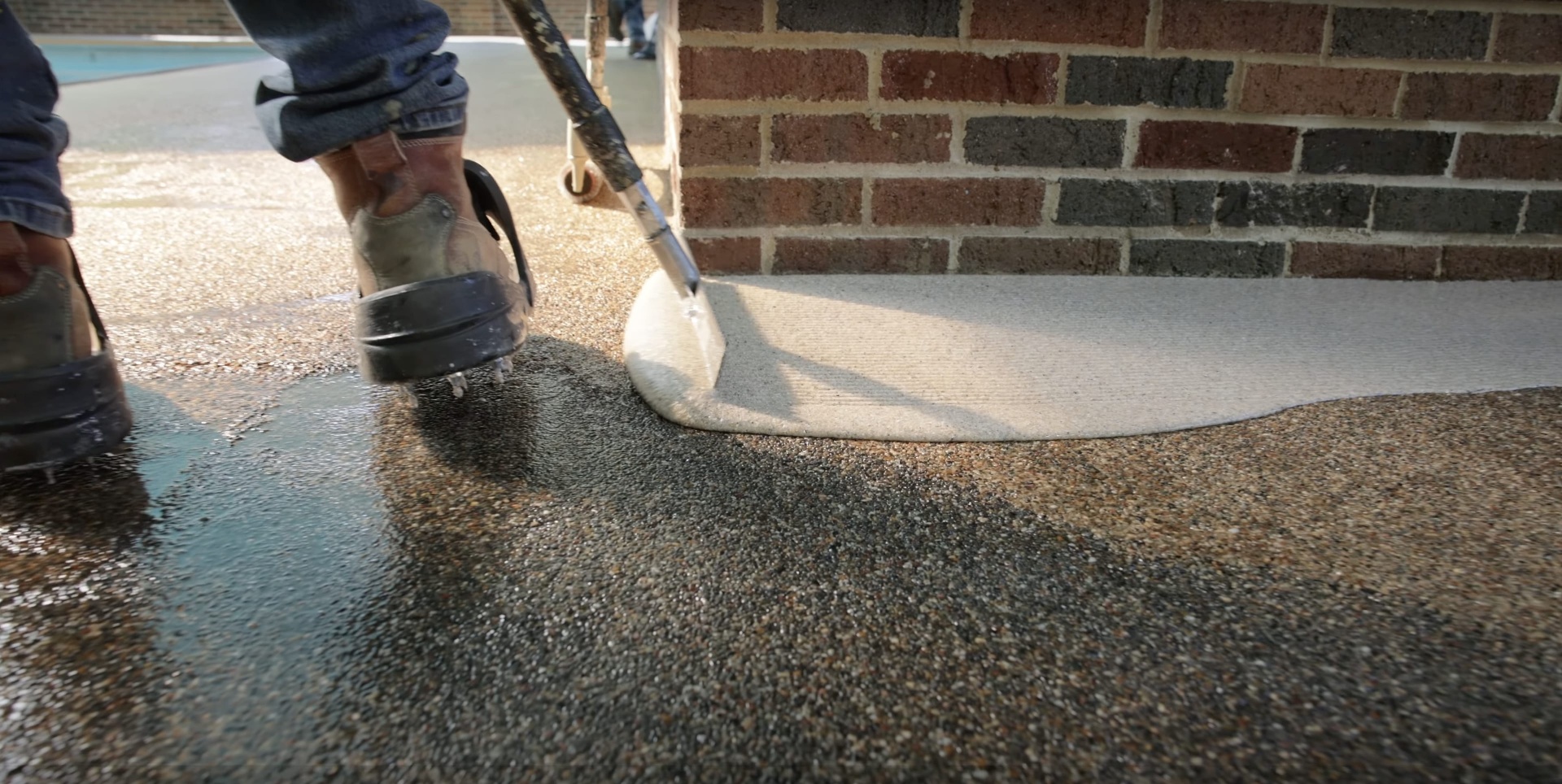 Professional Concrete Surface Finishing Professional concrete surface finishing using specialized tools for smooth texture
